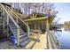 Covered dock with picnic table and lake access at 387 W Roszell Dr, Nineveh, IN 46164