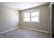 Bedroom with hardwood floors and two large windows at 4201 Westbourne Dr, Indianapolis, IN 46205