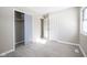 Bedroom with hardwood floors, closet and two windows at 4201 Westbourne Dr, Indianapolis, IN 46205