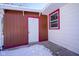Rear exterior door with access to patio area at 4201 Westbourne Dr, Indianapolis, IN 46205