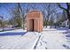 Wooden shed in backyard during snowy winter day at 4201 Westbourne Dr, Indianapolis, IN 46205