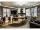 Home office with built-in cabinetry and curved desk at 441 W Main St, Carmel, IN 46032