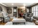 Elegant living room with a neutral color palette and cozy seating area at 441 W Main St, Carmel, IN 46032