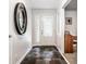 Bright entryway with slate tile floor and mirror at 500 W 93Rd St, Indianapolis, IN 46260