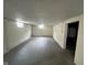A basement with painted walls and concrete floors at 529 S Kiel Ave, Indianapolis, IN 46241