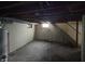 Unfinished basement with painted walls, exposed ceiling, and mechanicals at 529 S Kiel Ave, Indianapolis, IN 46241