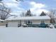 Ranch home with attached garage, snow covered lawn at 529 S Kiel Ave, Indianapolis, IN 46241