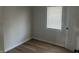 Bright bedroom with hardwood floors and neutral walls at 555 N Oakland Ave, Indianapolis, IN 46201