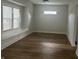 Spacious dining area with hardwood floors and built-in window seat at 555 N Oakland Ave, Indianapolis, IN 46201