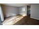 Living room with neutral walls and carpet at 5619 N Rural St, Indianapolis, IN 46220