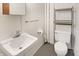 Small basement bathroom with toilet and sink at 6072 Meridian St W Dr, Indianapolis, IN 46208