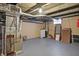 Unfinished basement with utilities and storage at 6072 Meridian St W Dr, Indianapolis, IN 46208