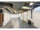 Unfinished basement with open space and windows at 6072 Meridian St W Dr, Indianapolis, IN 46208