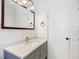 Updated bathroom with gray vanity and marble countertop at 6072 Meridian St W Dr, Indianapolis, IN 46208