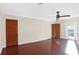 Bright bedroom with hardwood floors and French doors at 6072 Meridian St W Dr, Indianapolis, IN 46208