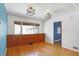 Dining room with hardwood floors and built-in cabinets at 6072 Meridian St W Dr, Indianapolis, IN 46208