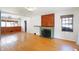 Living room with hardwood floors, built-ins, and fireplace at 6072 Meridian St W Dr, Indianapolis, IN 46208