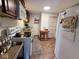 Well-lit kitchen featuring updated appliances and a functional design for meal preparation at 630 E Mccarty St, Indianapolis, IN 46203
