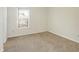 Bright bedroom with window and neutral walls at 6670 W Irving Dr, McCordsville, IN 46055