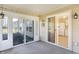 Cozy sunroom featuring sliding glass doors, providing access to the outdoors at 6670 W Irving Dr, McCordsville, IN 46055