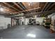 Unfinished basement with ample storage shelving at 7201 E 71St St, Indianapolis, IN 46256