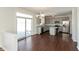 Modern kitchen with gray cabinets, granite countertops, and island at 7618 Corsican Cir, Avon, IN 46123