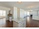 Modern kitchen with gray cabinets, granite countertops, and island at 7618 Corsican Cir, Avon, IN 46123