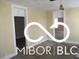 Living room with beige walls and hardwood floors at 815 W 28Th St, Indianapolis, IN 46208