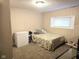 Finished basement bedroom with neutral walls and a paisley bedspread at 9812 W 900 N Rd, Elwood, IN 46036