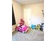 Playful bedroom with toys and carpeted floors at 9812 W 900 N Rd, Elwood, IN 46036