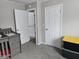 bedroom with crib and dresser at 9812 W 900 N Rd, Elwood, IN 46036
