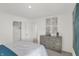 Bright bedroom features a queen-sized bed, decor, and bedside tables at 11614 Hartwell St, Indianapolis, IN 46235