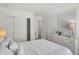 Well-lit bedroom with closet, white dresser, and tasteful decor offers comfort and style at 11614 Hartwell St, Indianapolis, IN 46235