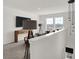 Stylish loft area with shiplap walls, modern furnishings, and natural light at 11614 Hartwell St, Indianapolis, IN 46235