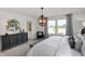 Beautifully decorated bedroom with stylish furniture, large windows, and ample natural light at 11614 Hartwell St, Indianapolis, IN 46235