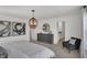 Spacious bedroom featuring elegant decor, modern lighting, and comfortable furnishings at 11614 Hartwell St, Indianapolis, IN 46235