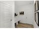Functional mudroom with a bench, storage cubbies, and convenient access to the exterior at 11614 Hartwell St, Indianapolis, IN 46235