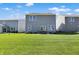 Backyard features a well manicured lawn and patio at 11620 Hartwell St, Indianapolis, IN 46235