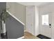 Inviting entryway featuring modern decor, stylish staircase, and natural light at 11626 Hartwell St, Indianapolis, IN 46235