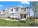 Charming two-story home with a manicured lawn, inviting entrance, and a two-car garage at 11626 Hartwell St, Indianapolis, IN 46235