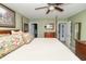 Main bedroom with king-size bed and access to the bathroom at 1226 Arlington Dr, Greenfield, IN 46140