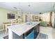 Open concept kitchen with island, stainless steel appliances, and dining area at 1226 Arlington Dr, Greenfield, IN 46140
