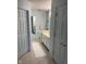 Clean bathroom with double vanity and updated fixtures at 1294 Lexington Trl, Greenfield, IN 46140