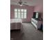 Bright bedroom featuring a comfortable bed and plenty of space at 1294 Lexington Trl, Greenfield, IN 46140