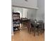 Bright dining area with a table and chairs, near a mirrored wall at 1294 Lexington Trl, Greenfield, IN 46140