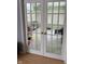 Sunroom with tiled floor and access to backyard at 1294 Lexington Trl, Greenfield, IN 46140