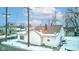 Side view of house, snow covered yard at 1363 & 1367 S Belmont Ave, Indianapolis, IN 46221