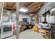 Unfinished basement with washer, dryer, and workbench at 1363 & 1367 S Belmont Ave, Indianapolis, IN 46221