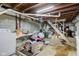 Unfinished basement with laundry area and storage at 1363 & 1367 S Belmont Ave, Indianapolis, IN 46221