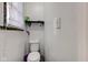 Small bathroom with toilet and shower at 1363 & 1367 S Belmont Ave, Indianapolis, IN 46221